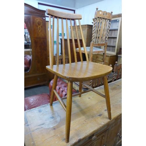 193 - A set of four beech kitchen chairs