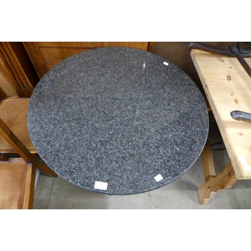 198 - An Art Deco style cast iron and granite topped circular table