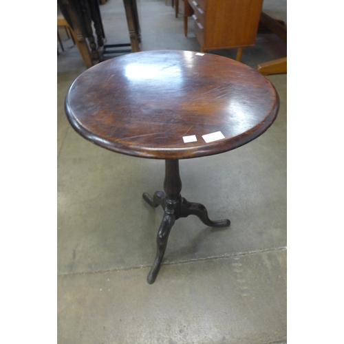 203 - A mahogany and oak circular tripod table