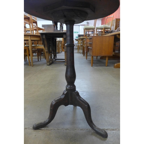 203 - A mahogany and oak circular tripod table