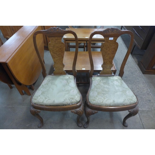 205 - A pair of George l style walnut side chairs