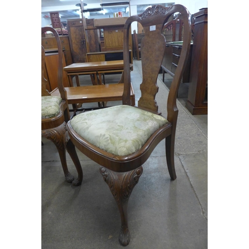 205 - A pair of George l style walnut side chairs