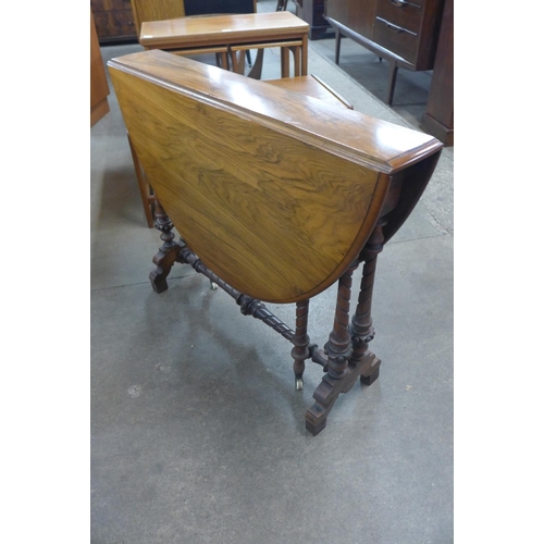 207 - A Victorian walnut Sutherland table, 71cms h x 88cms l