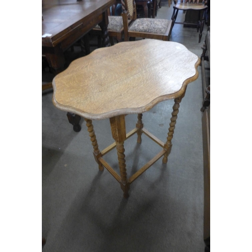 209 - Three oak barleytwist occasional tables