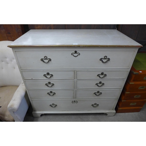 219 - A George III painted oak chest of drawers (top adapted to lift up)