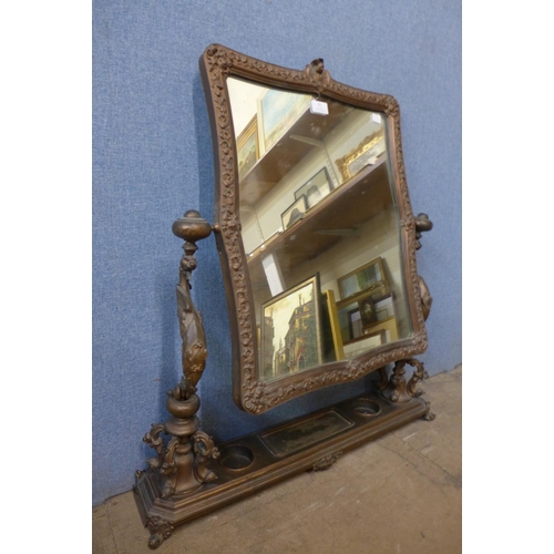 31 - A 19th Century French copper dressing table mirror, 79cms h