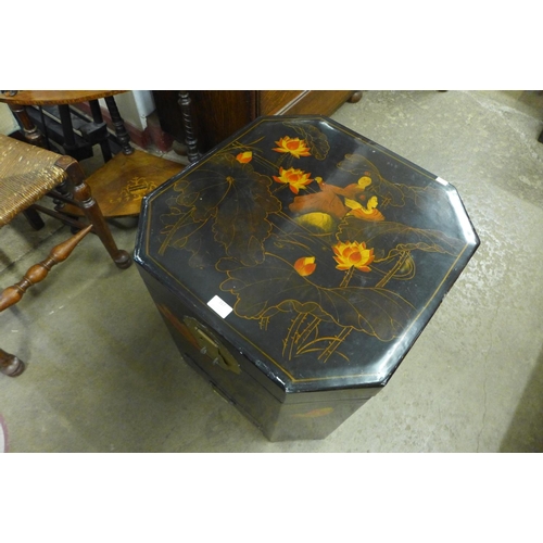 317 - A Japanese painted and lacquered octagonal box