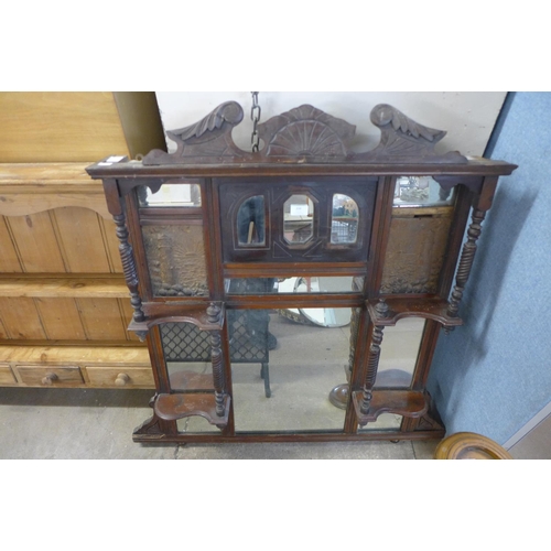 334 - A Victorian mahogany overmantel mirror, a pine Delft rack, an oak barleytwist smoker's stand and a s... 