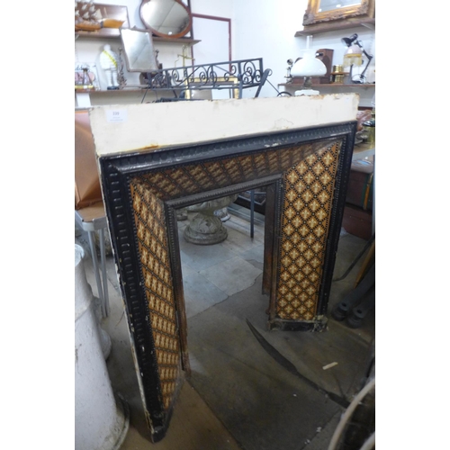 339 - A Victorian cast iron fire insert