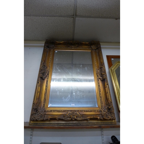 34 - A large gilt framed mirror, 126 x 97cms