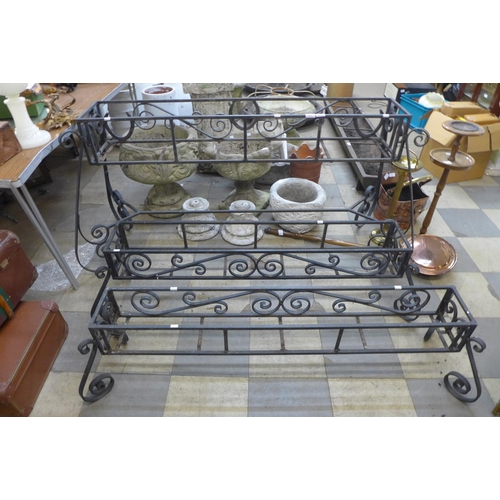 348 - Three wrought iron planter frames