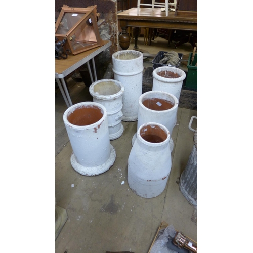 351 - Six painted chimney pots