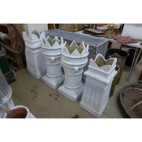 356 - Four painted crown top chimney pots