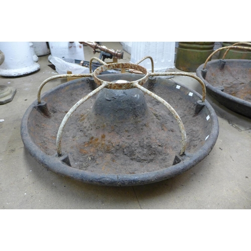 360 - A cast iron Mexican hat pig feeder