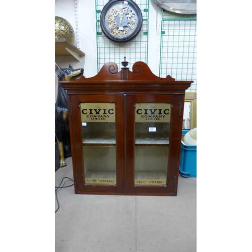 394 - A Victorian mahogany counter top shop cabinet, bearing Civic Company Limited inscription to doors, 7... 