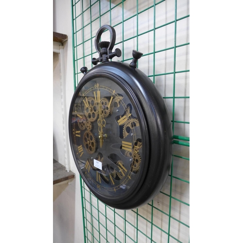 397 - A French style circular skeleton wall clock