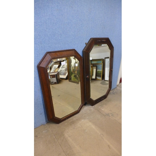 402a - Two oak octagonal framed mirrors