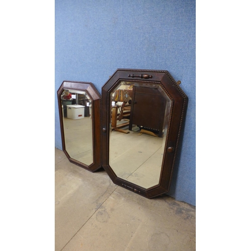 402a - Two oak octagonal framed mirrors