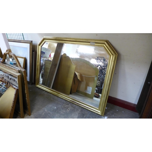 403 - Two gilt framed overmantel mirrors