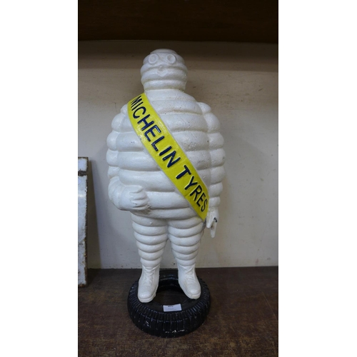 405 - A cast iron Michelin Man advertising figure