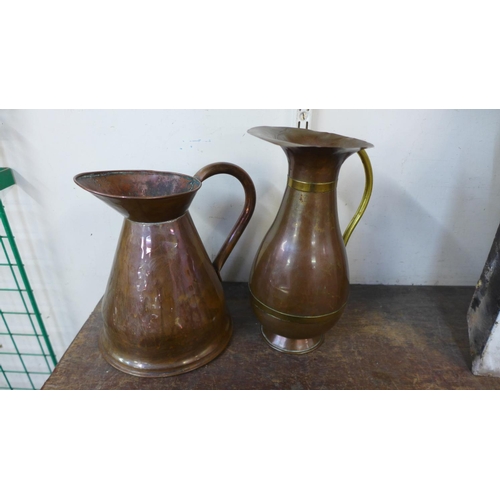 407 - Two brass fire extinguishers and two copper jugs