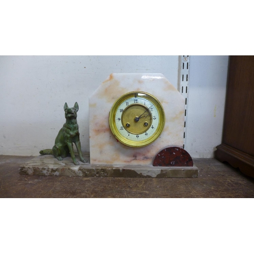 409 - A French Art Deco marble clock garniture