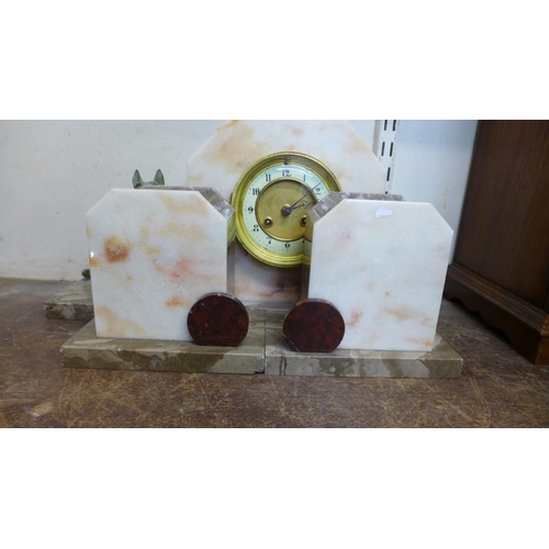 409 - A French Art Deco marble clock garniture