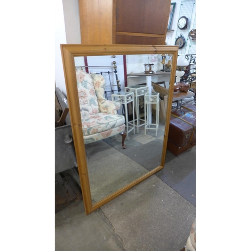 413 - A large pine framed mirror