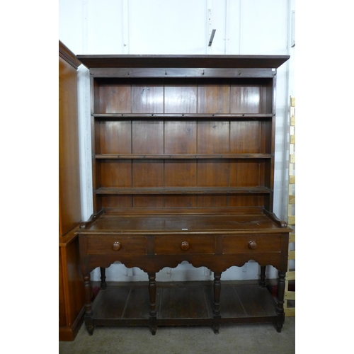 45 - A Victorian stained pine dresser, 207cms h, 152cms w, 47cms d