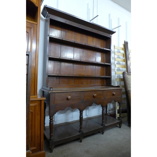 45 - A Victorian stained pine dresser, 207cms h, 152cms w, 47cms d