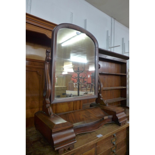 47 - A Victorian mahogany toilet mirror, 80cms h