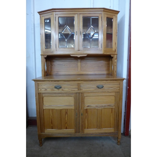 51 - A Victorian style pine dresser, 198cms h, 125cms w, 56cms d