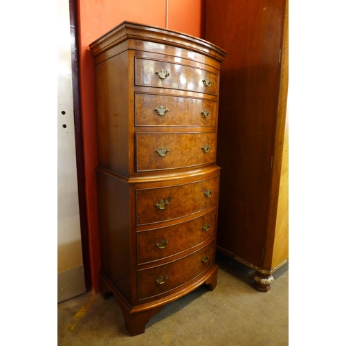 53 - A George III style burr walnut bow front chest on chest, 133cms h, 58cms w, 41cms d