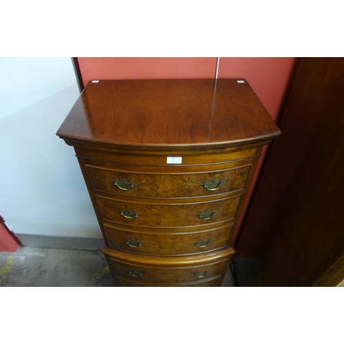 53 - A George III style burr walnut bow front chest on chest, 133cms h, 58cms w, 41cms d