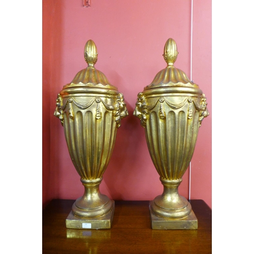 60 - A pair of large George III style gilt urns and covers, 88cms h    (20038898)   #