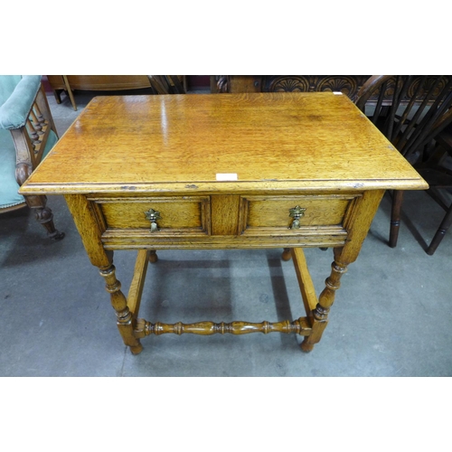 80 - A 17th Century style Ipswich oak side table, 71cms h x 77cms w