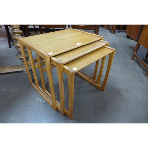 95 - A teak nest of tables