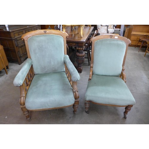 82 - A pair of Victorian Gothic Revival oak and upholstered lady's and gentleman's chairs