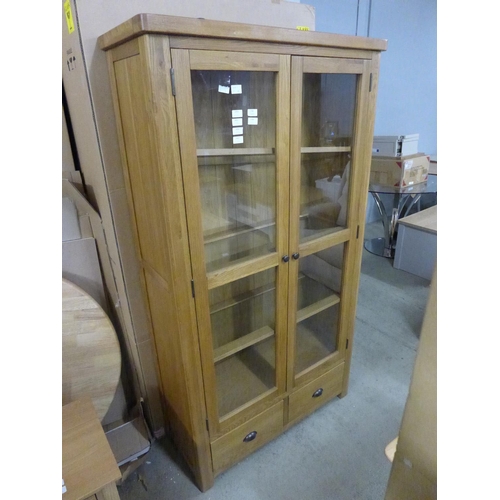 1821 - An oak glazed display cabinet