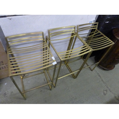 1901 - Three brass effect stools - damaged  *This lot is subject to VAT