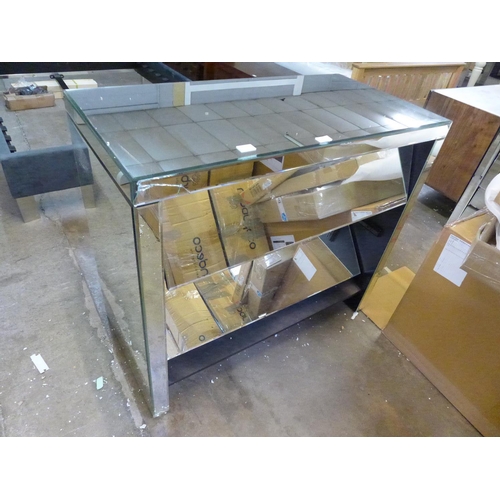 1908 - A mirrored chest of three drawers - damaged  *This lot is subject to VAT