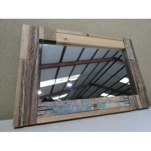 3030 - A rustic framed wall mirror (45cm x 30cm) * This lot is subject to VAT