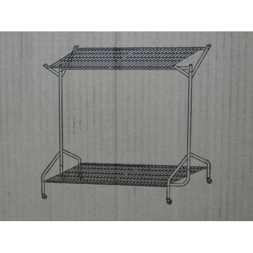 3053 - A 6ft heavy duty clothes rail with mesh bottom * This lot is subject to VAT