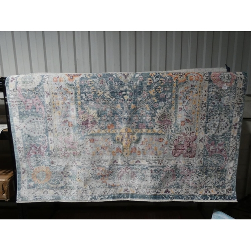 3063 - A teal/cream patterned rug (200 x 300cm) * this lot is subject to VAT