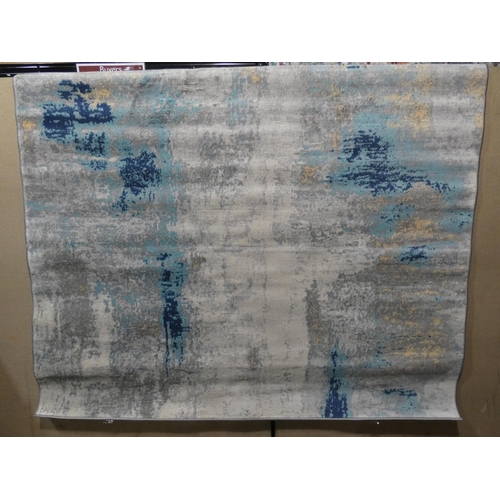 3069 - A cream/blue patterned rug (200 x 200cm) * this lot is subject to VAT