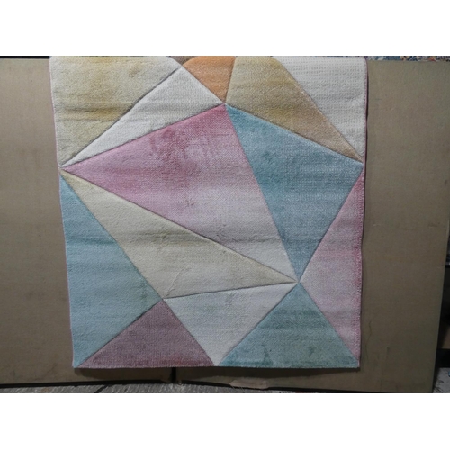 3073 - A white/teal/pink patterned rug * this lot is subject to VAT