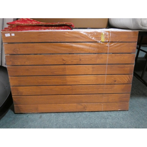 3110 - A wooden slatted table * this lot is subject to VAT