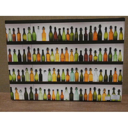 3137 - A bottle print on canvas (50 x 35cm) * this lot is subject to VAT