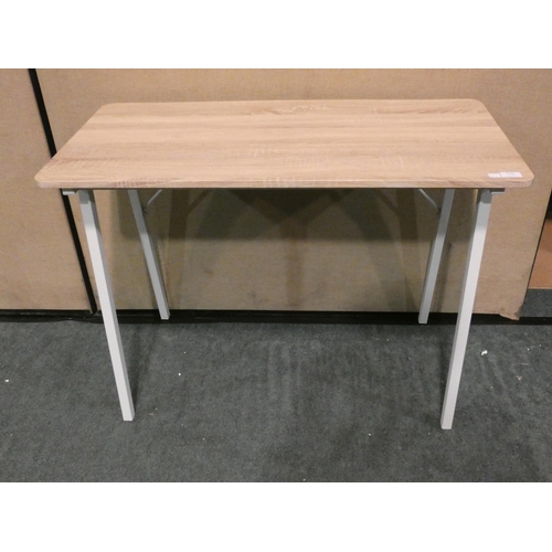 3141 - A natural wood/white metal framed desk/table * this lot is subject to VAT