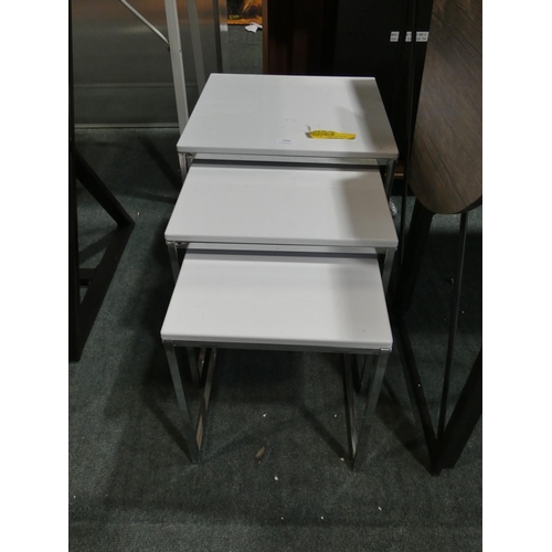 3166 - A white/chrome finish nest of three tables * this lot is subject to VAT